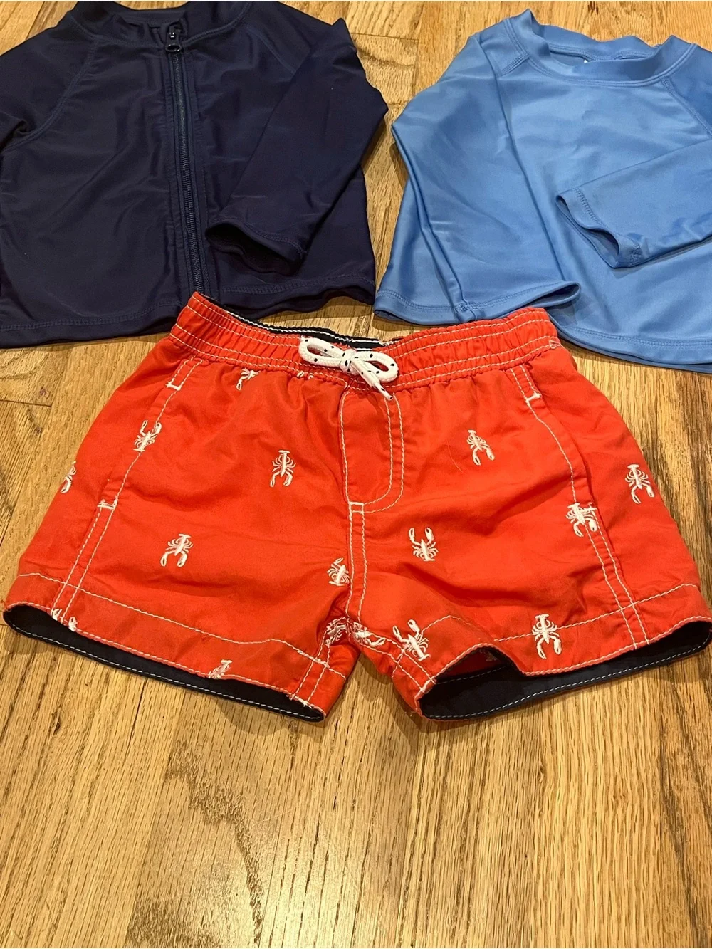 Bundle of 3 swim/sun 12 mos - swim trunk, zip up navy & light blue rash-guards